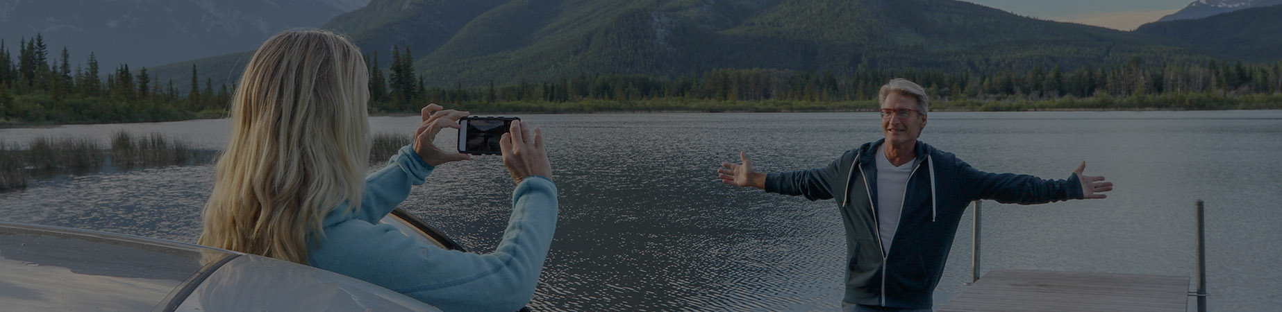 Sea Foam background image showing women taking picture of man